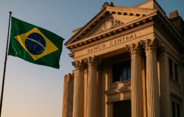 ブラジル中央銀行の本庁舎と国旗の前景、仮想通貨規制開始を象徴する構図