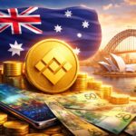 オーストラリアの国旗とシドニーの風景を背景に、Binanceのロゴコインや豪ドル紙幣を配置したイラスト。Binanceが豪ドルの入出金サービスを再開したことを象徴するビジュアル。