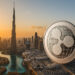 ドバイの未来的な都市景観とブロックチェーンを象徴するイメージ。不動産のトークン化とXRP Ledgerの採用を示唆。