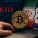 仮想通貨とイラン・イスラエルの国旗を背景にしたハッキング被害を示すリアルな構成イメージ