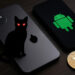 iPhoneとAndroid端末を狙う仮想通貨マルウェアのイメージ。黒猫のシルエットとビットコインが暗示的に配置されている