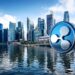 シンガポールの金融街を背景にしたRippleロゴのイメージ写真